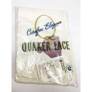 Carefree Elegance Quaker Lace White Oval Tablecloth 64" x 84"